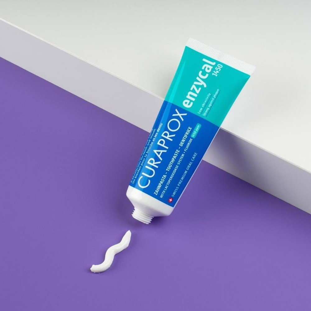 Kem đánh răng ngừa sâu răng Enzycal 1450ppm 75ml - Curaprox