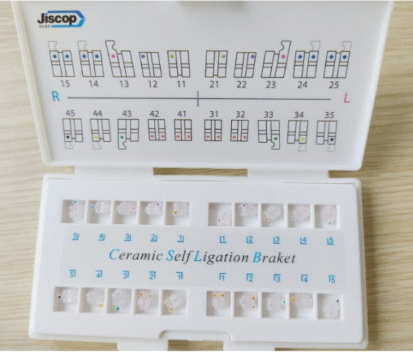 Mắc cài sứ tự buộc Clarus-C ( Nắp sứ ) MBT - Jiscop
